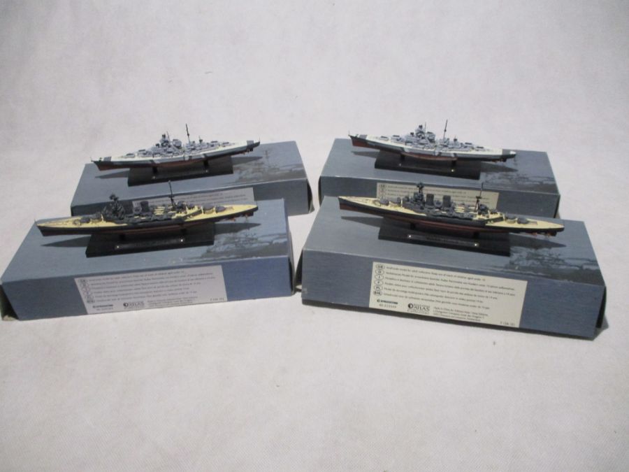 A collection of four boxed Atlas Editions warships including two HMS Hood's and two Bismarck's