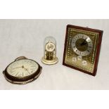 Three clocks including Capital anniversary clock, Keinzle wall hung clock with zodiac symbols and