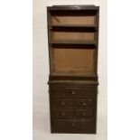 A wooden painted workshop cupboard with shelves above and six drawers below