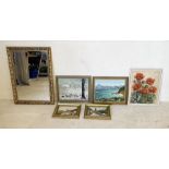 A collection of various paintings along with a mirror including two by Dave Thomas