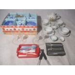A collection of dolls house tea ware, cutlery etc.
