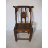 A Japanese ceremonial willow chair