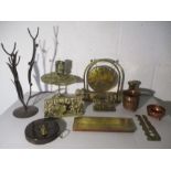 A collection of brass and copper items including a gong, a weight etc, plus an Arts and Crafts