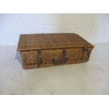 A picnic hamper, comprising cups, plates and cutlery etc