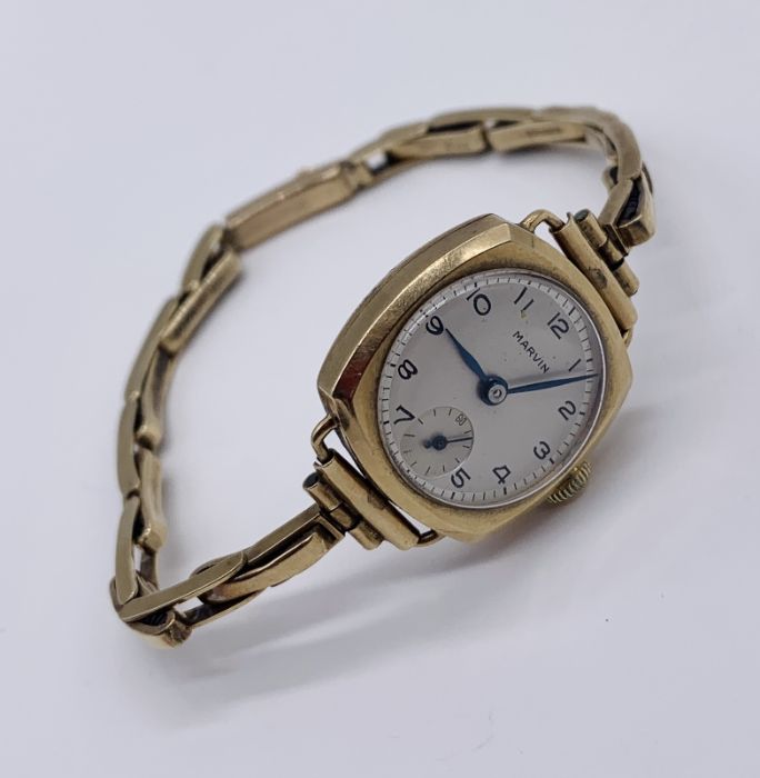 A Marvin 9ct gold ladies watch with 9ct strap- total weight including movement 16.3g