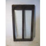 An antique wooden framed window