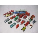 A collection of mainly Dinky and Corgi die-cast toy vehicles including a car transporter, fire