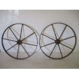 A pair of cast irons wheels - diameter 99cm