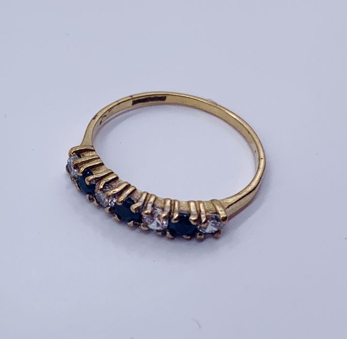 A diamond and sapphire 7 stone ring set in 9ct gold - Image 2 of 3