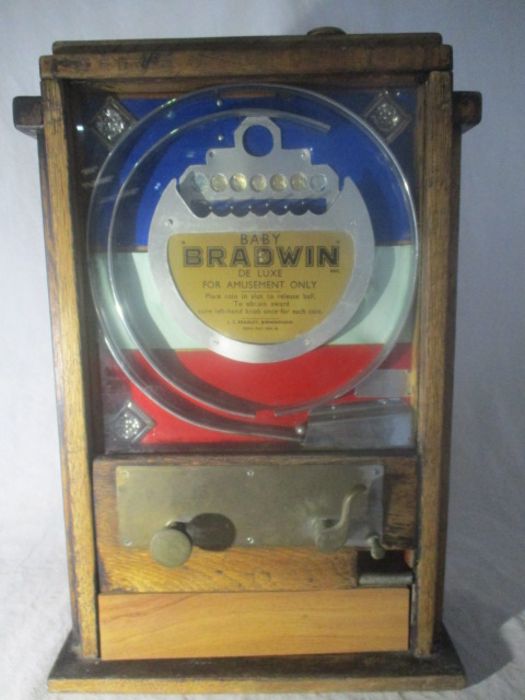 A Baby Bradwin De Luxe amusement arcade penny slot machine by L C Bradwin, Birmingham