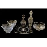 A collection of Waterford Crystal including two decanters, three bowls and a square dish.