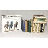 A collection of various vintage books on the subject of horse racing/breeding including "Winners for