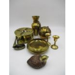 A small collection of brassware including a vase, bowl, dwarf candlesticks etc