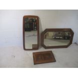 An oak framed mirror, a mid century mirror, plus a tray.