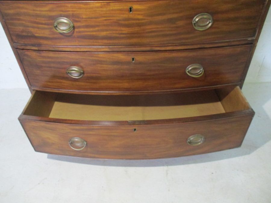 A Georgian mahogany bow fronted chest of drawers. - Image 10 of 10