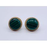 A pair of hallmarked 9ct gold earrings set with malachite