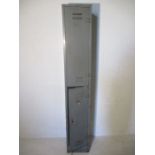 Metal double locker unit, height 183cm, no keys. A/F