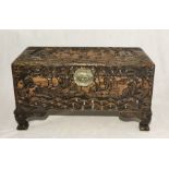 An Eastern carved wooden table top chest depicting sailing boats