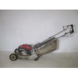 A Honda HR194 petrol lawn mower.