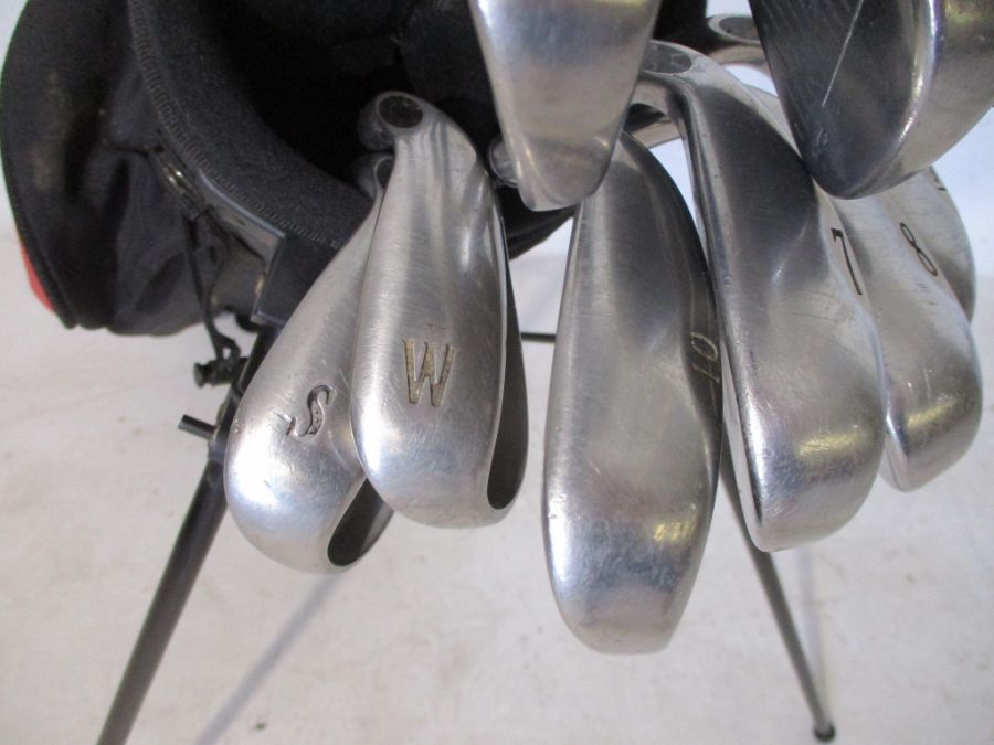 A set of Callaway "Big Bertha" golf clubs including drivers, irons 4 to 10, sand wedge and - Image 7 of 9