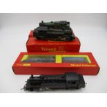 A boxed Tri-ang Hornby OO gauge "Caledonian" locomotive with tender, along with three Tri-ang