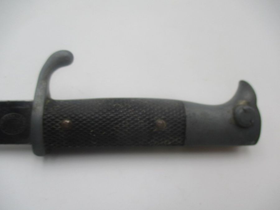A German WWII bayonet, the steel blade stamped E u F Horster, Solingen, with eagle head handle, - Image 2 of 7
