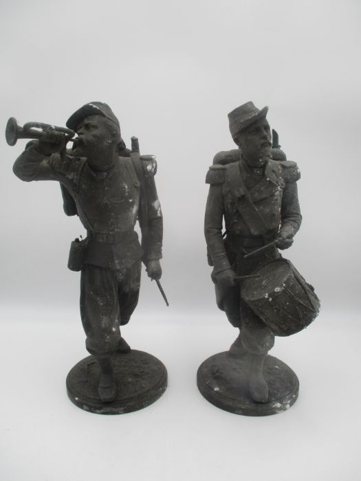 A pair of French spelter soldiers, a drummer and a bugler, height 37cm