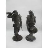 A pair of French spelter soldiers, a drummer and a bugler, height 37cm