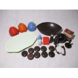A collection of various vintage Bakelite items including a bowl, pair of door handles, Patwin rug