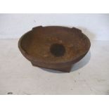 A cast iron trough - diameter 44.5cm height 18cm