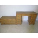 A bamboo framed desk, along with a matching chest of two drawers