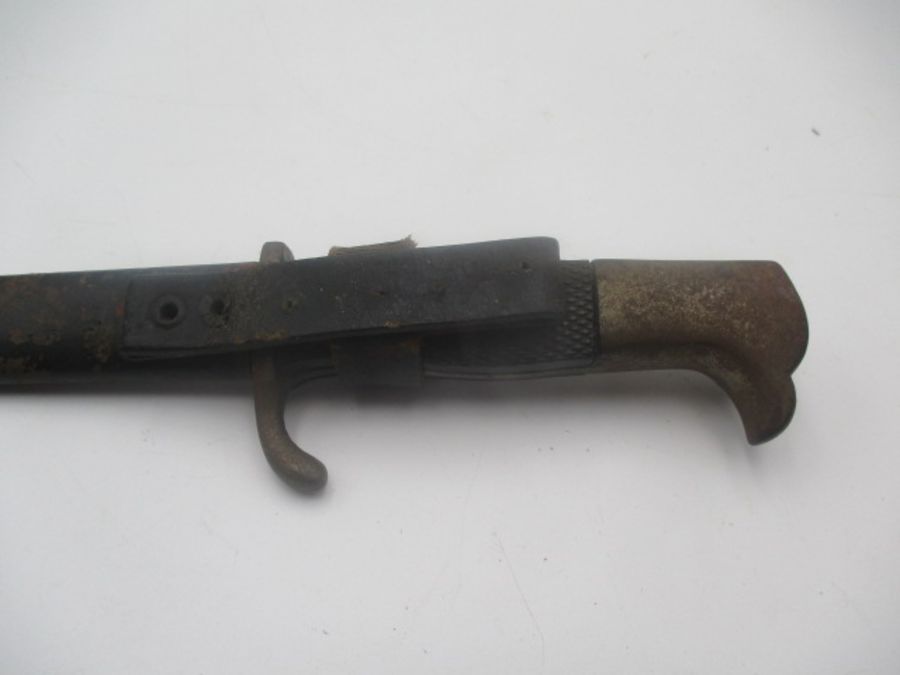 A German WWII dagger with eagle head handle over black chequered grip in metal scabbard - Image 10 of 10