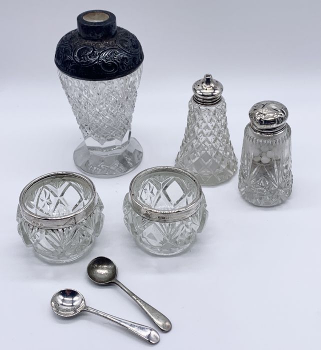 A small collection of silver mounted condiments etc.