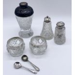 A small collection of silver mounted condiments etc.