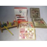 A Corgi Charrington liveried Ltd edition model along with two wooden block puzzles and a