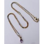 An amethyst pendant set in 14ct gold along with a fine 14ct gold chain