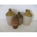 A collection of three stoneware cider flagons, along with one other