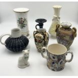 A collection of china including a Belleek vase, Denby stoneware jug, Victorian loving cup with