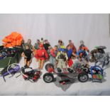 A collection of Action Man figures and accessories