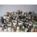 A large collection of miniature jugs etc