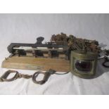 An assortment of vintage items, an Adapta No.4 heavy duty hole punch, a pair of iron handcuffs, A