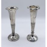 Two similar hallmarked silver trumpet vases