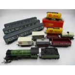 A Hornby OO gauge locomotive and tender (8509), along with three Inner City coaches and a
