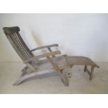 A wooden garden steamer chair. A/F