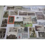 A collection of photographs, postcards etc including various postcards from Lyme Regis/Uplyme etc.