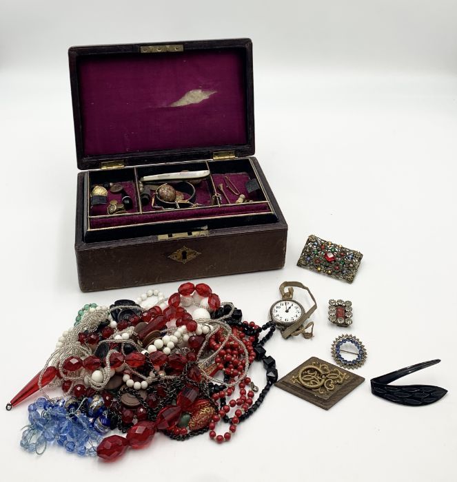 A collection of costume jewellery etc. in a leather jewellery box