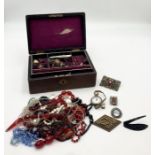 A collection of costume jewellery etc. in a leather jewellery box