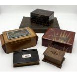 A collection of wooden and lacquered boxes