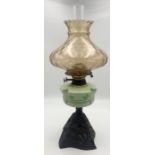 A Victorian oil lamp with shade and chimney on brass base, Duplex burner to top.