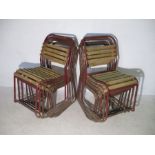 A set of twelve tubular and slatted stacking chairs - few slats missing